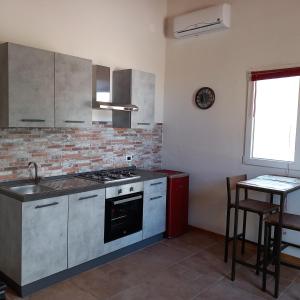 Dimore del Carrubo - openspace con piscina