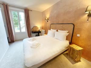 B&B / Chambres d'hotes La Maison Voyage Bed and Breakfast : Chambre Double - Vue sur Jardin