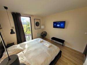 Villas Villa en bois a la campagne - 20 min de Rouen : photos des chambres