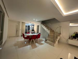 casa arejada em condomínio na praia de atlântida