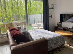 Le petit Hameau, t2 avec jardin et parking