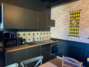 Appartements Le Manoir des Sortileges a Reims : photos des chambres