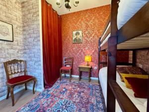 Appartements Le Manoir des Sortileges a Reims : photos des chambres