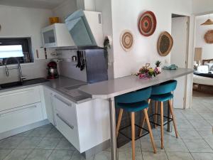 Appartements La Discrete : photos des chambres