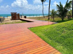 Viva muro alto flat vista mar