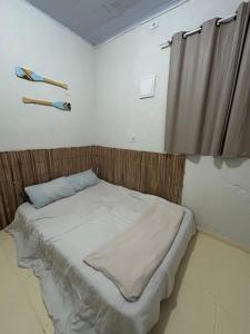 Casa com ar condicionado e churrasqueira próx Praia