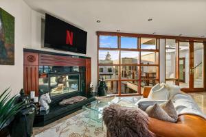 Brand New Listing Elegant 7BR Masterpiece Walk to Beach Shops & Dining