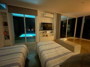 Casa en Vistalba para dos personas con yacuzzi de temporada en la terraza