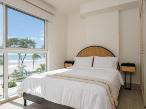 Playa Caracol Apt with Radisson Hotel Amenities