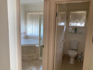 HOME STAY on HIGH King Bed -- Private Home with Private Bathroom