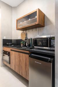 Unhotel - Apartamento Moderno Home Office - Praia e Metrô