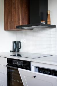 Celý apartmán v rodinném domě s vanou a krbem