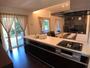 美ら海水族館まで車で3分の好立地ジャグジー付きの1棟貸Suppai Resort Okinawa