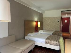 Chambre Lits Jumeaux avec Lit d’Appoint - 301