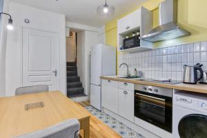 Maisons de vacances Loulou maison de ville sur 4 niveaux au coeur de ville : photos des chambres