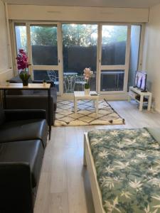 Appartements Magnifique Studio entier en RDC : photos des chambres
