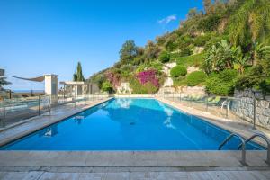 Appartements Les Miradors, charmant appartement de 2 chambres en RDC, jardin privatif, piscine, vue mer et parking : photos des chambres