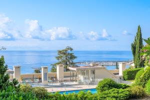 Appartements Les Miradors, charmant appartement de 2 chambres en RDC, jardin privatif, piscine, vue mer et parking : photos des chambres