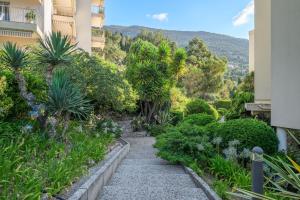 Appartements Les Miradors, charmant appartement de 2 chambres en RDC, jardin privatif, piscine, vue mer et parking : photos des chambres