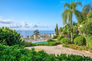 Appartements Les Miradors, charmant appartement de 2 chambres en RDC, jardin privatif, piscine, vue mer et parking : photos des chambres