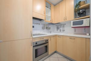 Appartements Les Miradors, charmant appartement de 2 chambres en RDC, jardin privatif, piscine, vue mer et parking : photos des chambres