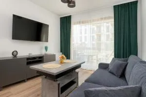 Przytulny Apartament z Ogródkiem i Parkingiem by Rent like home - Westerplatte