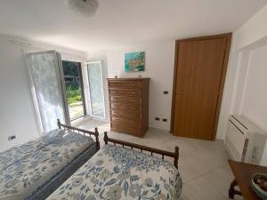 Appartamento con 2 camere da letto in villa con giardino e parcheggio