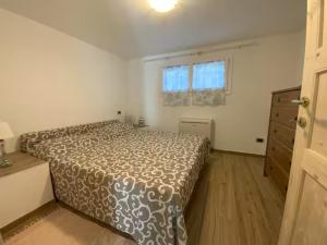 Appartamento con 2 camere da letto in villa con giardino e parcheggio