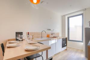 Appartements Lintemporel - travelhome : photos des chambres