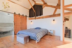Appartements Belle maison en pierres avec piscine : photos des chambres