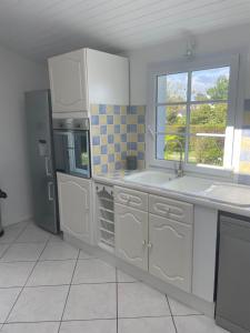 Maisons de vacances Location 6-8 personnes avec jardin 15 mn a pied du port : photos des chambres