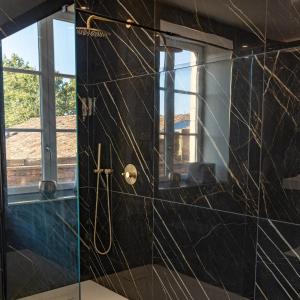 Appartements Le Boudoir du Beaujolais : photos des chambres