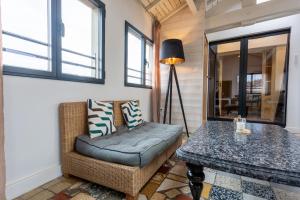 Maisons de vacances Le 9 Victor Hugo Vue sur les Toits, Loft Triplex avec terrasse, intra muros : photos des chambres