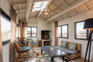 Maisons de vacances Le 9 Victor Hugo Vue sur les Toits, Loft Triplex avec terrasse, intra muros : photos des chambres