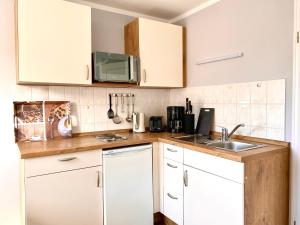 Hägerende 66 Haus Windrose Wohnung Ostwind