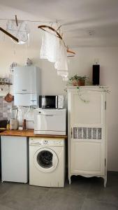 Appartements La Blanchisserie : photos des chambres