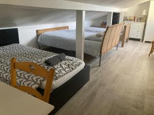 Maisons de vacances Maison avec vue sur Paris et la Tour Eiffel : photos des chambres