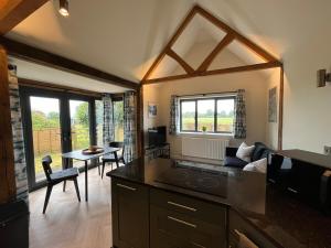 The Acorn Goodwood luxury lodge house 10 minute walk from Goodwood Festival of Speed