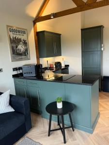 The Acorn Goodwood luxury lodge house 10 minute walk from Goodwood Festival of Speed