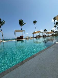 Viva muro alto flat pé na areia