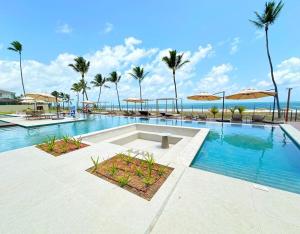 Viva muro alto flat pé na areia
