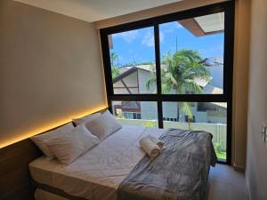 Viva muro alto flat pé na areia