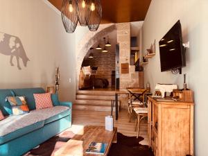 Appartements La Tannerie, centre historique, fibre, ESS, rez-de-chaussee, BedinShop : photos des chambres