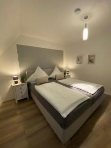 Ferienwohnung Ambiente II und III