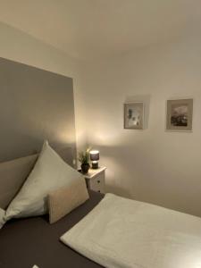 Ferienwohnung Ambiente II und III