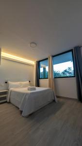 Bajo Capital Con Terraza y Aparcamiento Privado