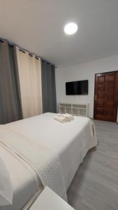 Bajo Capital Con Terraza y Aparcamiento Privado