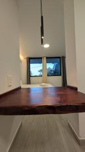 Bajo Capital Con Terraza y Aparcamiento Privado