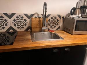 Appartements 2- Le chene bleu : photos des chambres