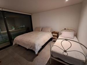 Dpto Av Las Condes lado Mall Sport